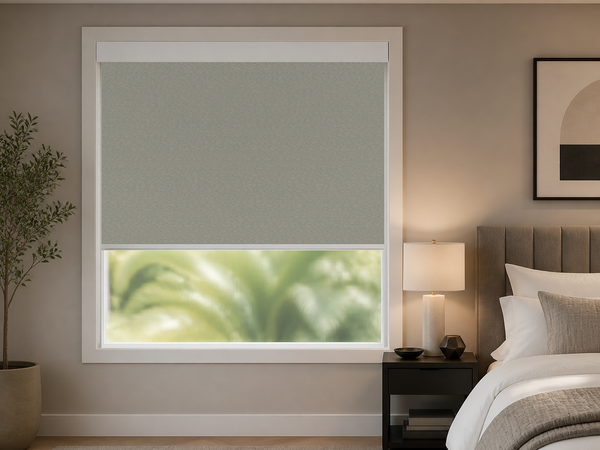 Silver stripe blackout roller shade in a polished urban bedroom