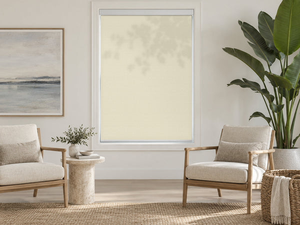 Natural linen light-filtering roller shade in a sitting room