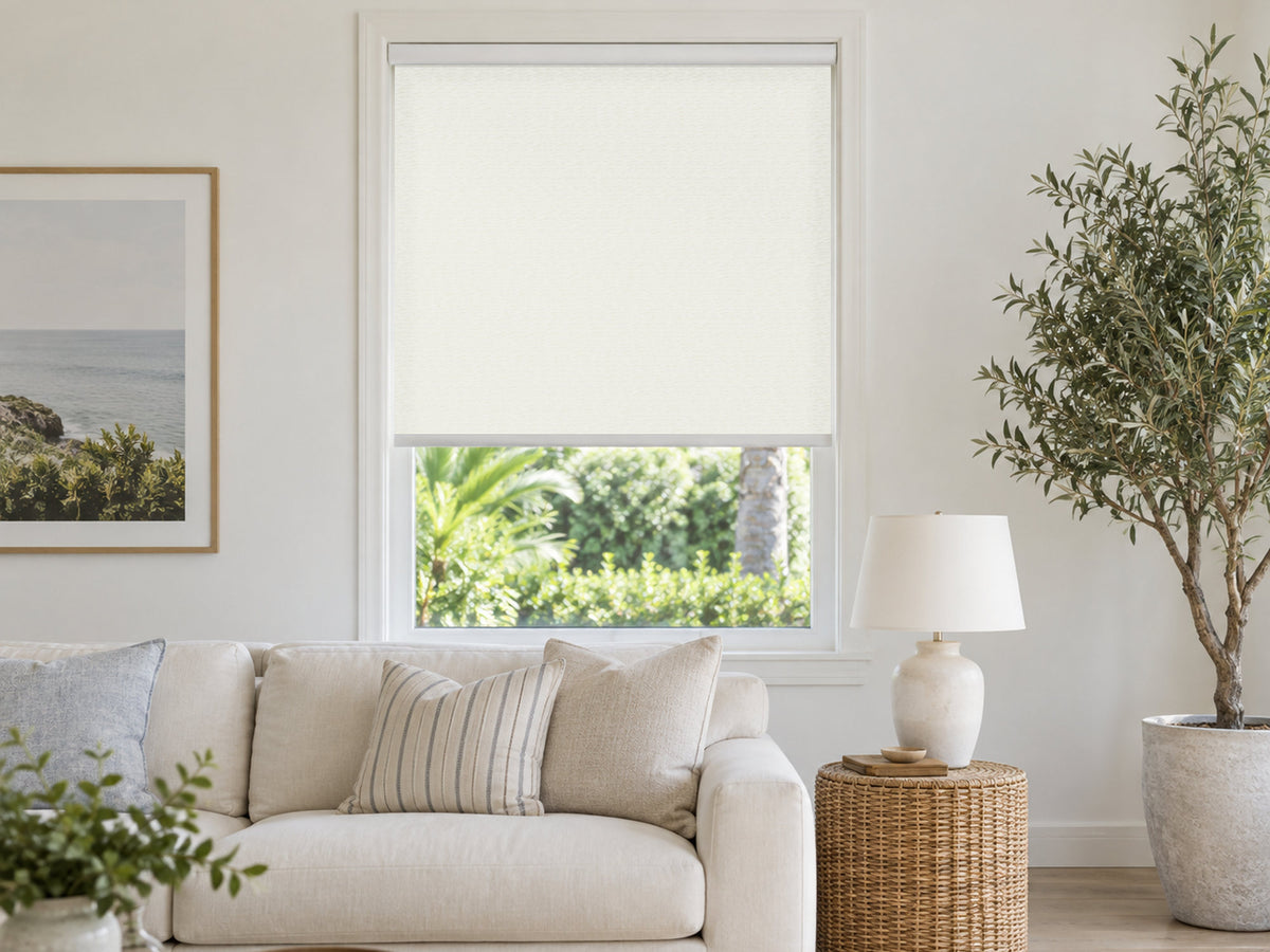 Sandbar light filtering roller shade in a living room