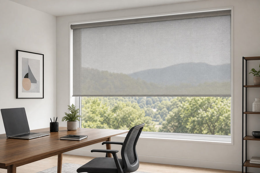 Solar roller shade reducing glare in a home office