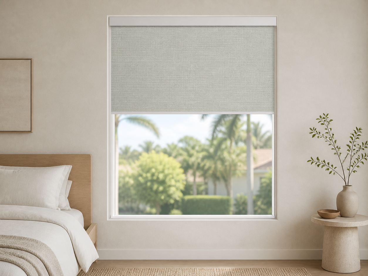 Mist fineweave blackout roller shade in a quiet minimalist bedroom