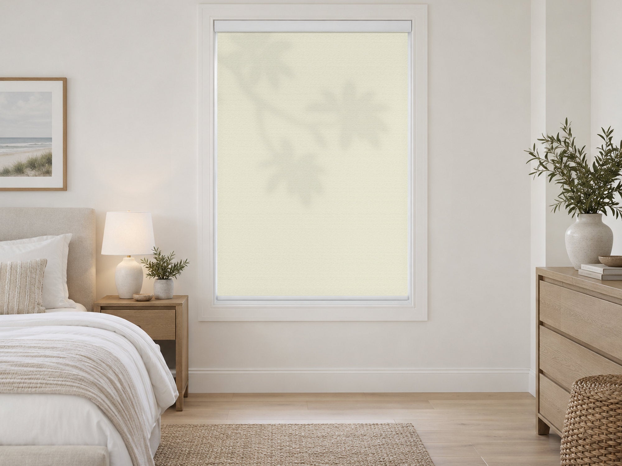 Linen light-filtering roller shade in a light neutral bedroom