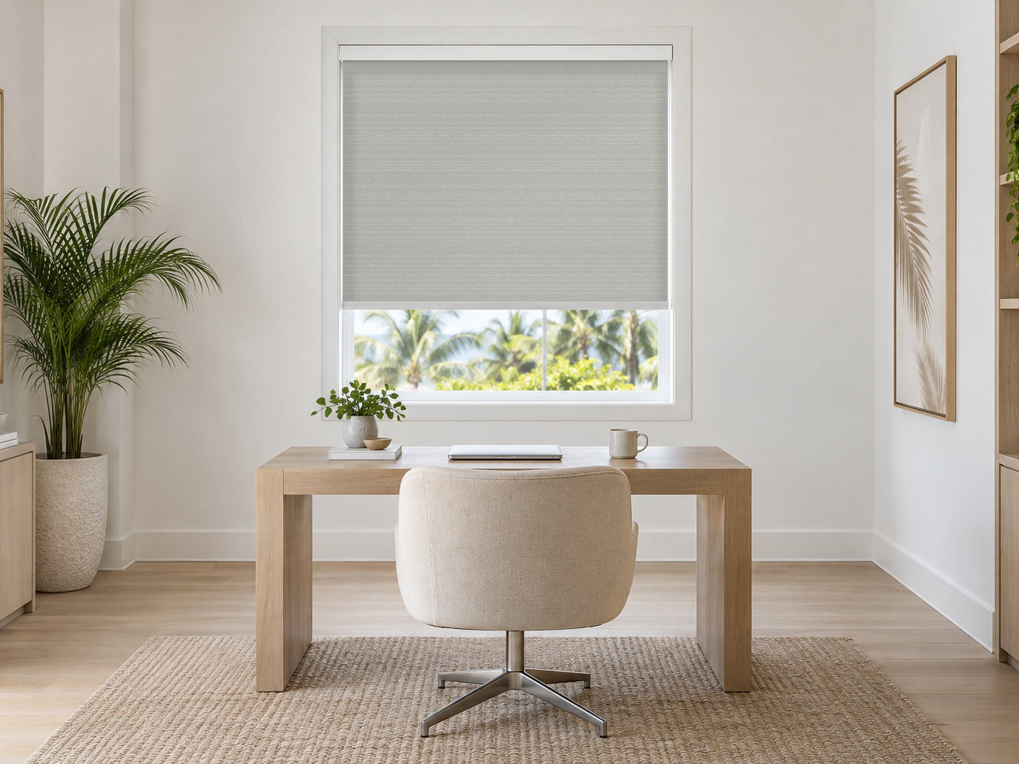 Pewter light-filtering roller shade in a calm home office