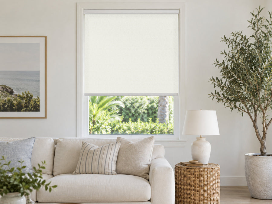 Sandbar light filtering roller shade in a living room
